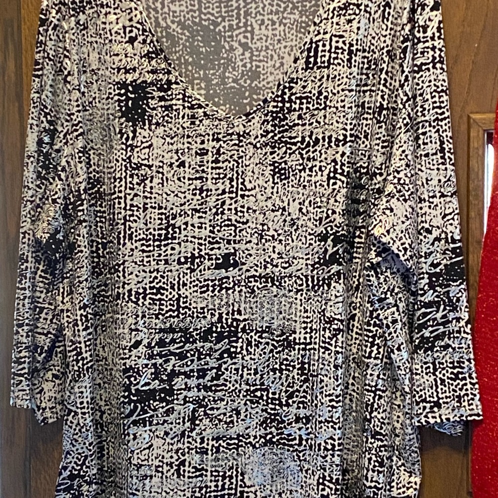 Beautiful, black and white printed blouse. Never worn.